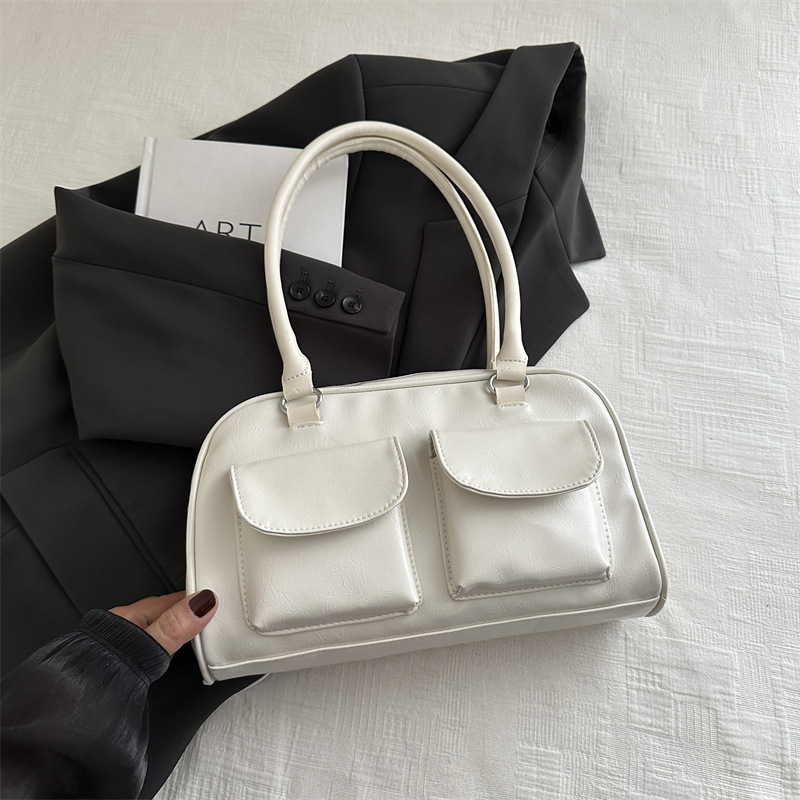 Versión coreana del bolso de axila de gran capacidad de alta calidad, bolso de mujer, nuevo bolso de bolos de gran capacidad, bolso de viaje simple