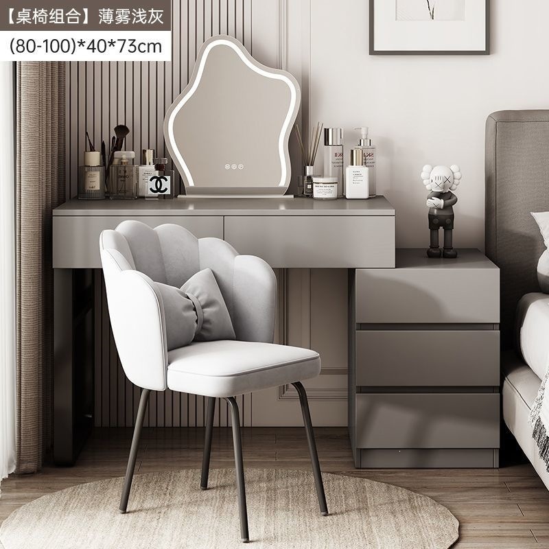 Wardrobe de madera maciza de tabla de roca dormitorio moderno simple pequeño tipo de lujo ligero de alta sensación armario de maquillaje en casa