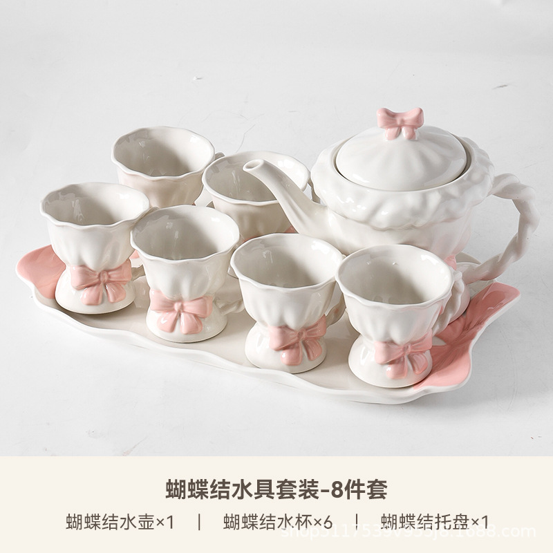 Una olla de cerámica, cuatro tazas de juego de té, caja de regalo de inauguración de la casa, lazo pintado a mano, taza de té de la tarde, regalo de boda