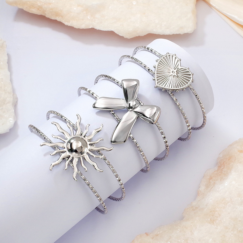 Brazalete solar abierto dorado de estilo europeo y americano para mujeres ligero lujo pequeño diseño de moda personalidad de esmeralda joyas de brazaletes universales