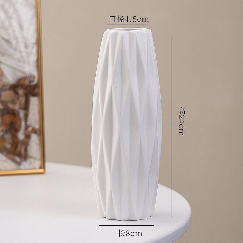 シンプルな現代の満天星陶磁器の花瓶の置物の客間の白い磁器の小さい清新な乾いた花の生け花の創意の陶磁器の花器|undefined