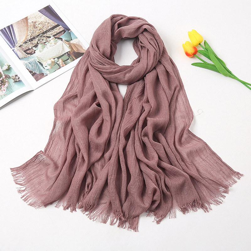 Women's Fashion Solid Color Cotton Tassel Cotton Linen Scarves display picture 10