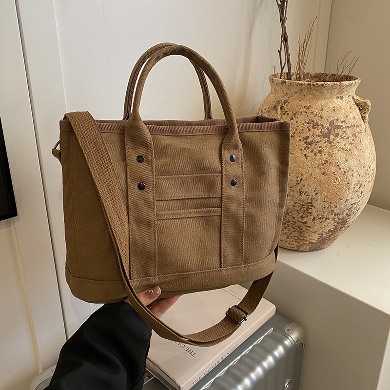 Bolsos de gran capacidad Bolsos de lona casuales de todo fósforo Bolsos de celebridades de Internet Bolsos de moda para estudiantes universitarios 2025 mujeres