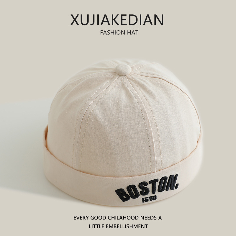 Sombreros de bebé primavera y otoño para niños primavera delgada personalidad sombrero de tierra para niños y niñas bordados letras sombrero de piel de melón bebé