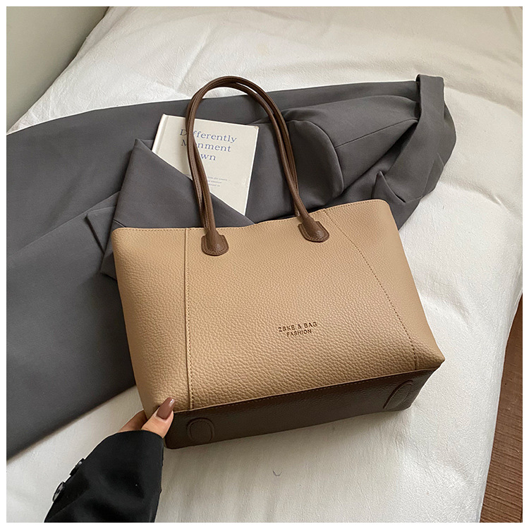 Casual bolsa de gran capacidad para mujeres 2025, nueva ciudad coreana simple alta sensación de viaje de moda bolso de hombro