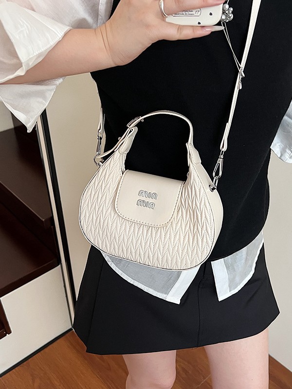 Bolso de nicho coreano bolso de bolsillo de mano 2026 ventas transfronterizas nuevas moda alta humedad mochila de hombro