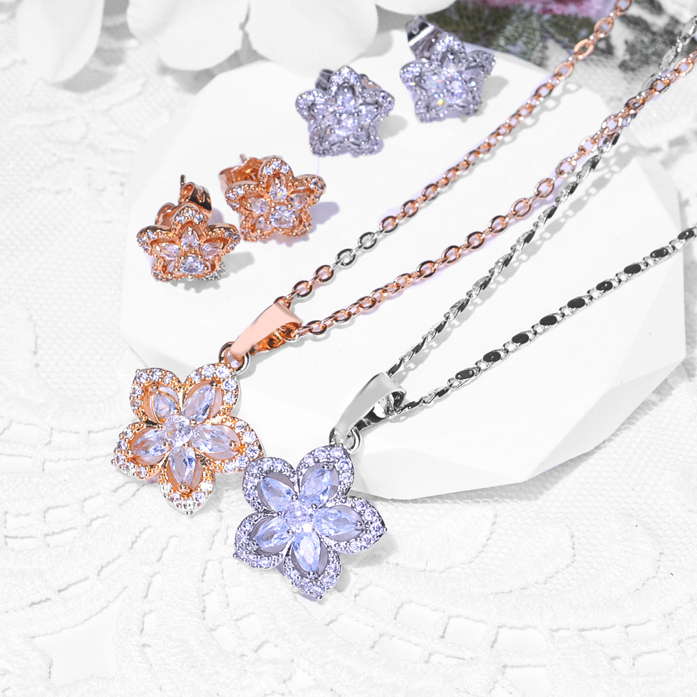 2024 diseño de flores de moda transfronteriza aretes de bronce de diamante collar conjunto de joyería aretes de joyería colgante