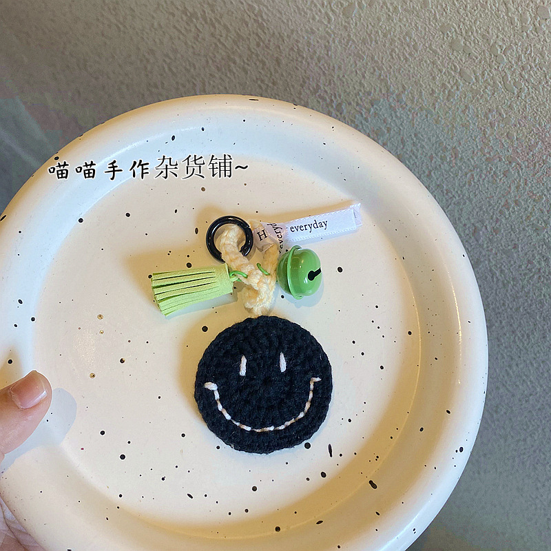 Estilo elegante GD cara sonriente sonrisa hecho a mano de lana colgante llavero bolsa decorativa dopamina accesorios producto terminado