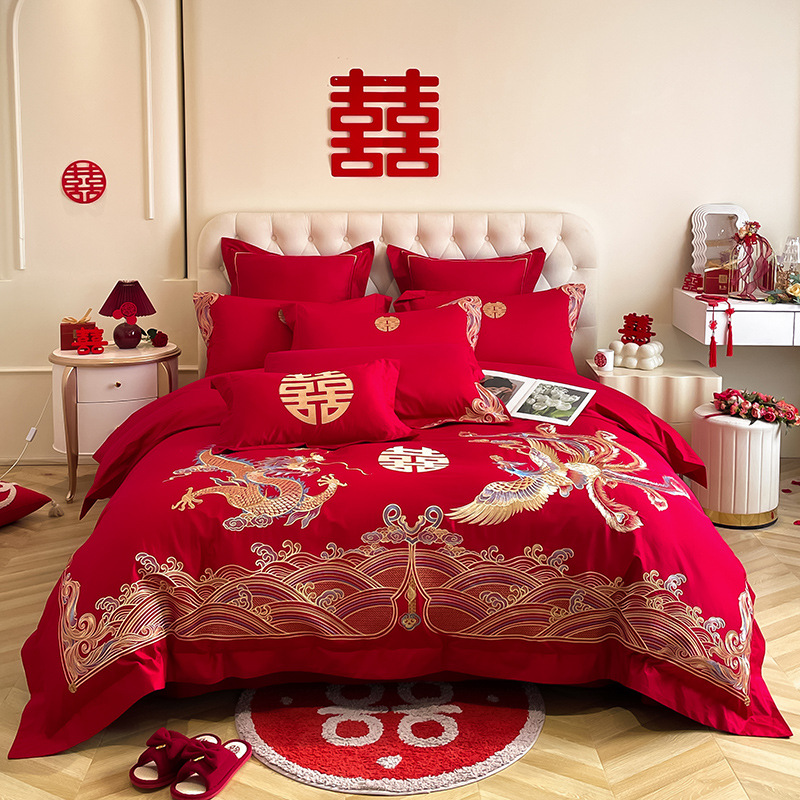 Una clase de madres y bebés de algodón de boda cuatro piezas grandes sábanas bordadas rojas chinas cubierta de cama de boda