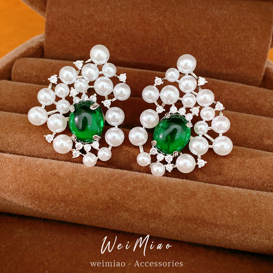 Agujas de plata de piedra de perla oval pendientes de perla estilo palacio delicado pendientes de nicho ligero lujo alta sensación auriculares al por mayor