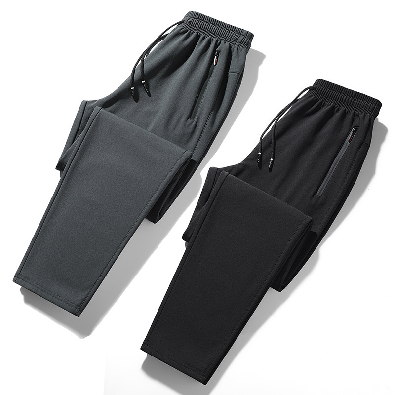 2024 pantalones gruesos de terciopelo para hombres pantalones deportivos casuales moda todo fósforo otoño e invierno pantalones deportivos delgados al por mayor
