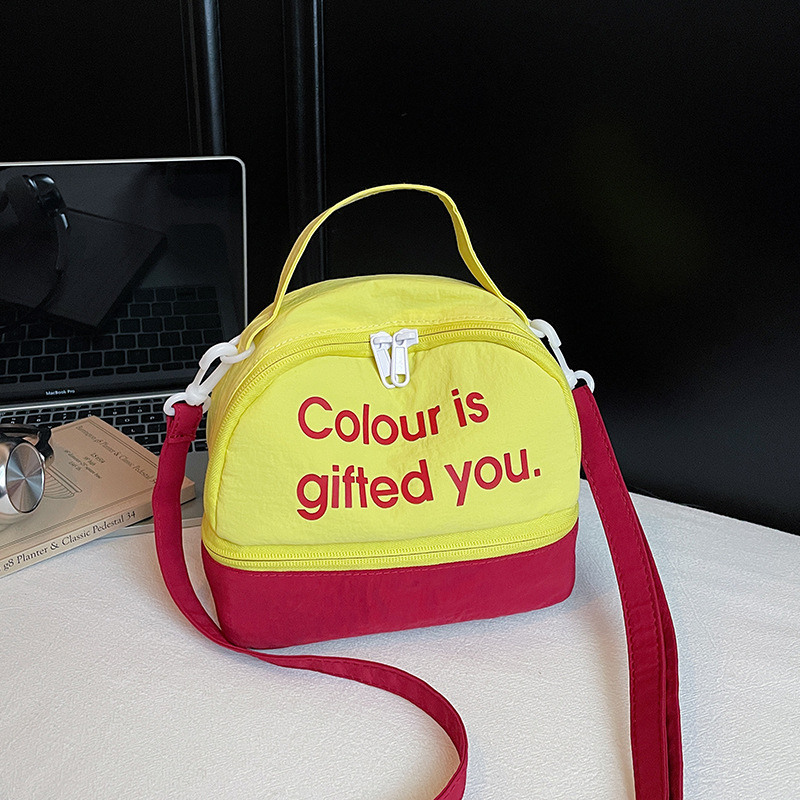 Bolso de moda coreana 2025 nuevo bolso femenino de lona estilo universitario letra bolso de hombro bolso de mensajero de color de contraste casual