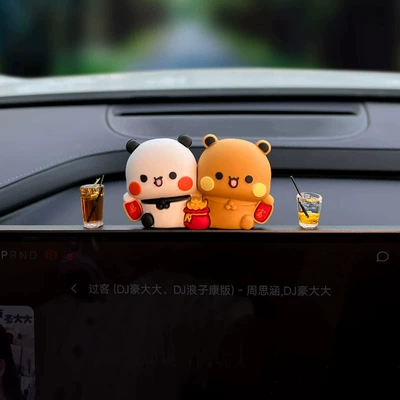 the car's center console — Car ornaments - get-rich-quick-with-these-two-items-american-coffee-and-lemon-tea-plus-a-free-tube-of-adhesive