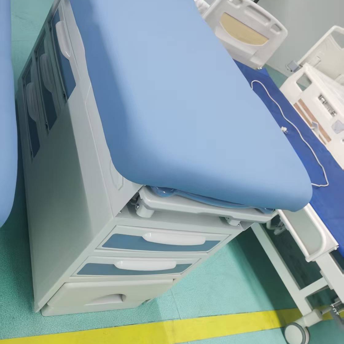 Cama de examen ginecológico americana, cama de diagnóstico hospitalario con cajón, cama de examen ginecológico con pedal, cama de diagnóstico ginecológico multifuncional image 3