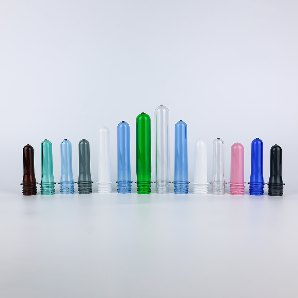 Proveedores al por mayor 28mm / 1810 botellas en blanco de grado alimenticio PET botellas en blanco de bebidas minerales botellas en blanco de nuevo material de producción