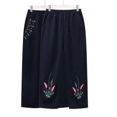 おばあさんの民族風のズボンの女性の高腰の綿麻のお母さんはズボンの春秋のズボンの中で老年の婦人服のカジュアルなズボンを詰めます。