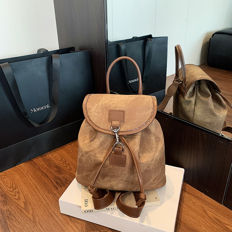Mochila coreana retro ocio de estilo extranjero para mujeres 2025 otoño moda ligera ocio viaje mochila pequeña