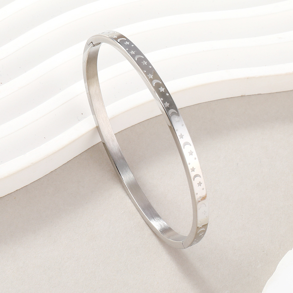 Joyería de acero inoxidable exquisita transfronteriza O-tipo hebilla pulsera mujer corrosión estrella Luna titanio acero pareja pulsera fábrica