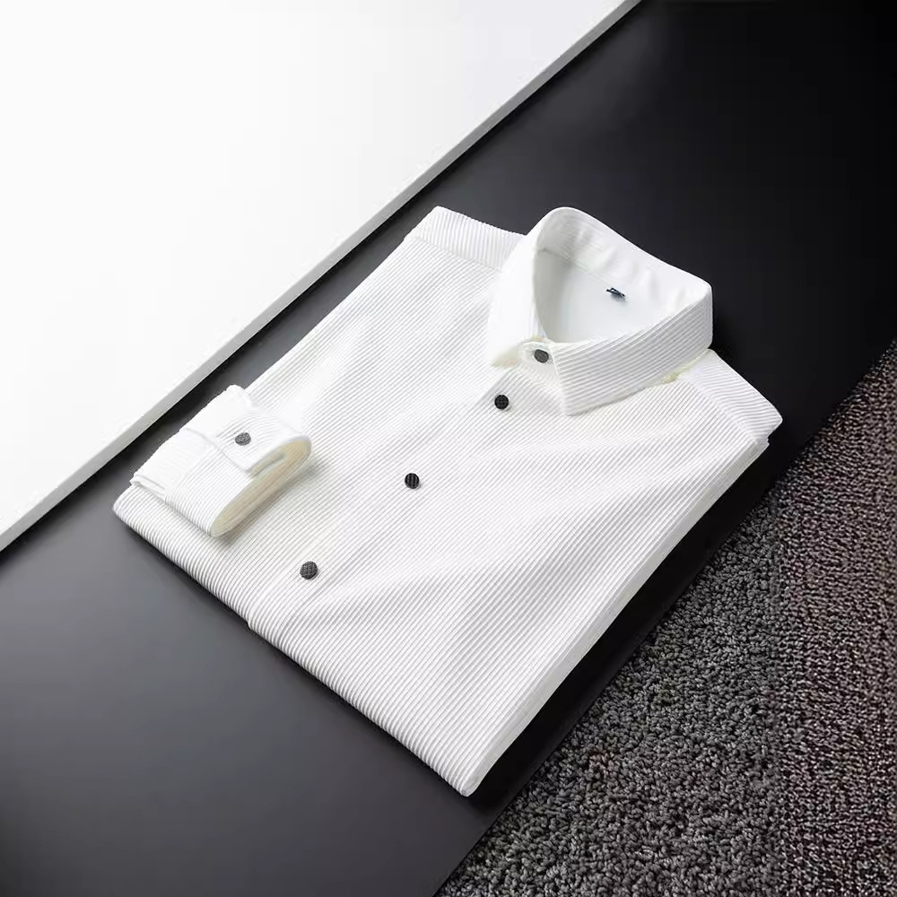 Luz de lujo primavera y otoño delgada no arremete contra las arrugas de negocios camisa blanca casual hombre de manga larga camisa de rayas verticales delgada hombre
