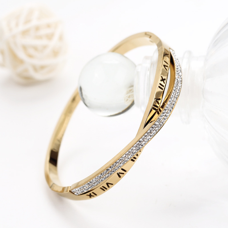 囊石交叉钛钢罗马手镯