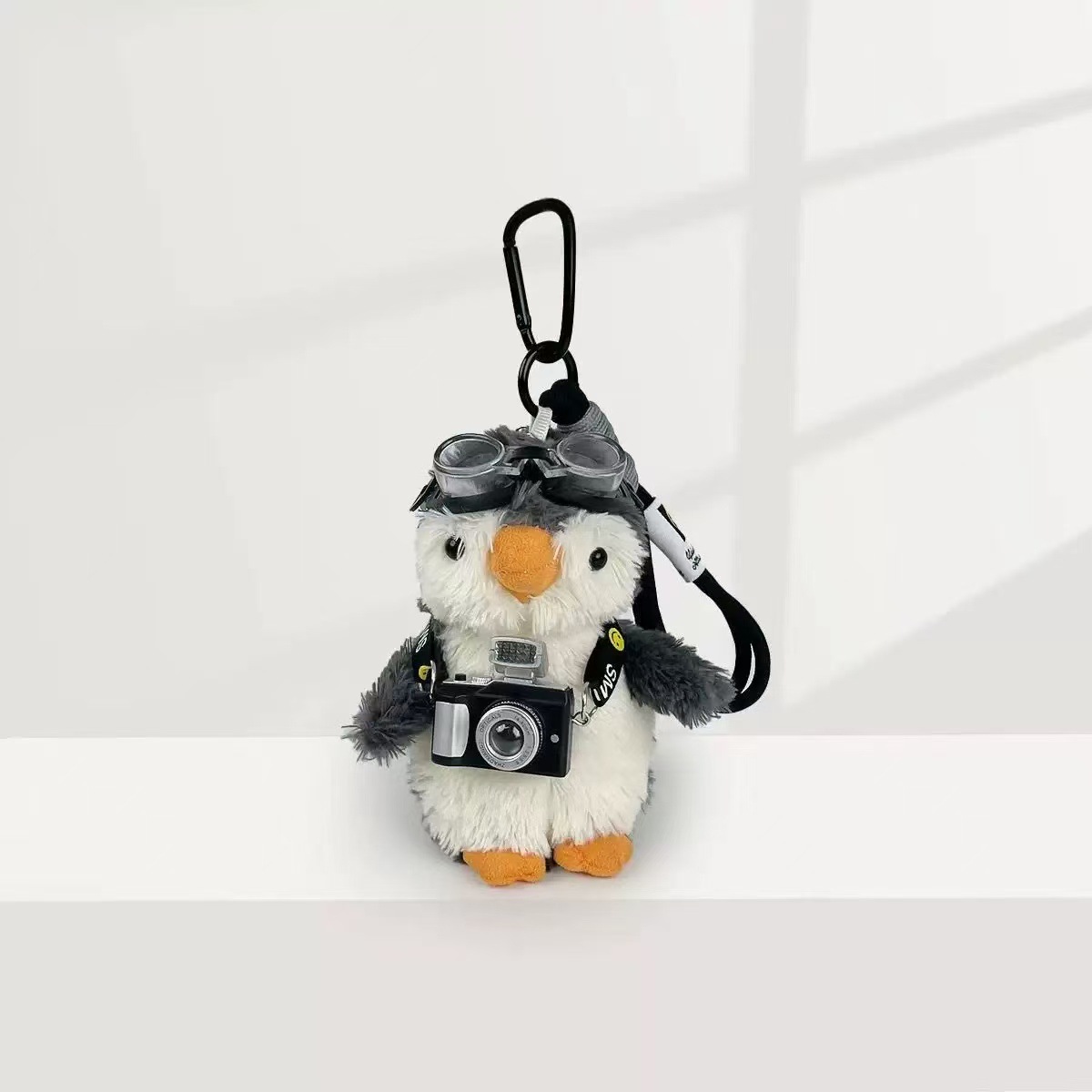 Cute cámara de dibujos animados pinguín vuelo muñeca colgante de alta calidad llavero de coche mochila colgante regalo