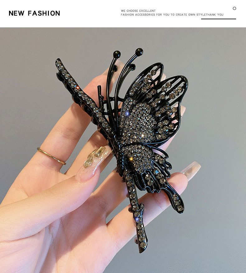 Fermaglio a farfalla nero con strass elegante accessorio capelli_voghion.com