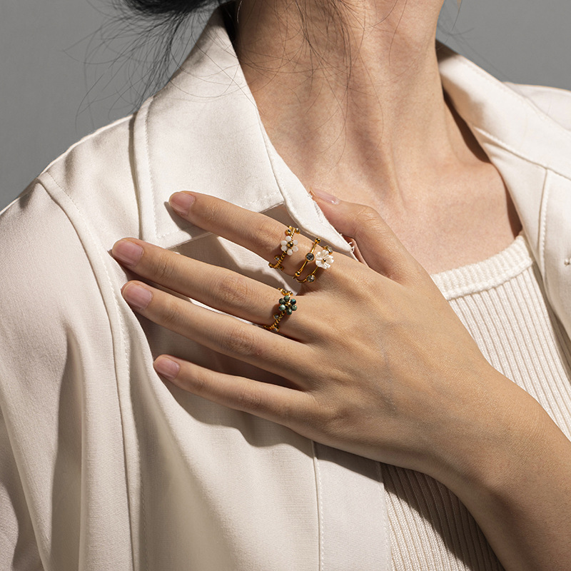 Tina europa y americana 18k oro chapado piedra natural acero inoxidable anillo de nicho femenino diseño anillos de pino africano anillos transfronterizos