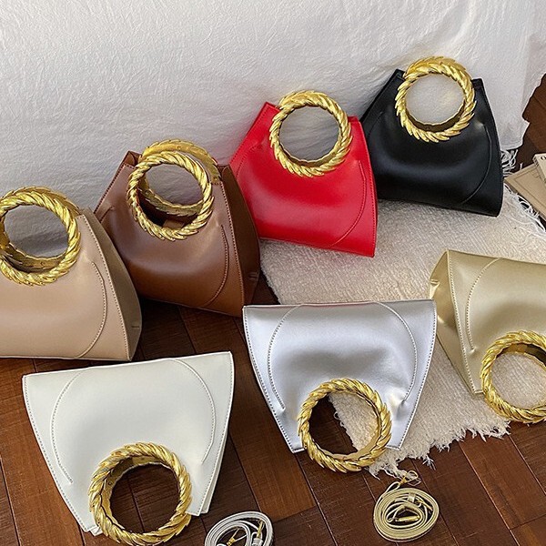 New PU Leather Solid Color European and American Women's Bag, Vintage High-End Evening Bag, Women's Metal Ring Handbag Wholesale New PU Leather Solid Color European and American Women's Bag, Vintage High-End Evening Bag, Women's Metal Ring Handbag Wholesale