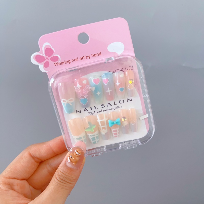 Niños que usan dibujos animados lindos 2025 nuevas niñas largas pegatinas de uñas blanquear niñas pegatinas de uñas para estudiantes de primaria