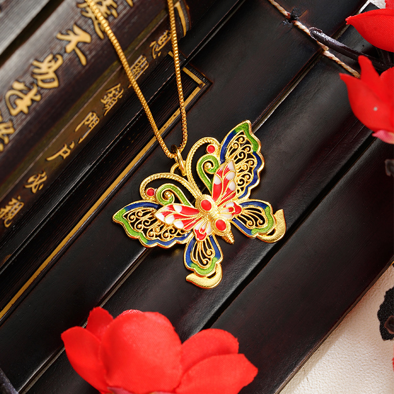 La herencia de la antigua ley de oro de arena vietnamita mariposa hueca color esmalte colgante de moda popular de moda nacional fuente popular