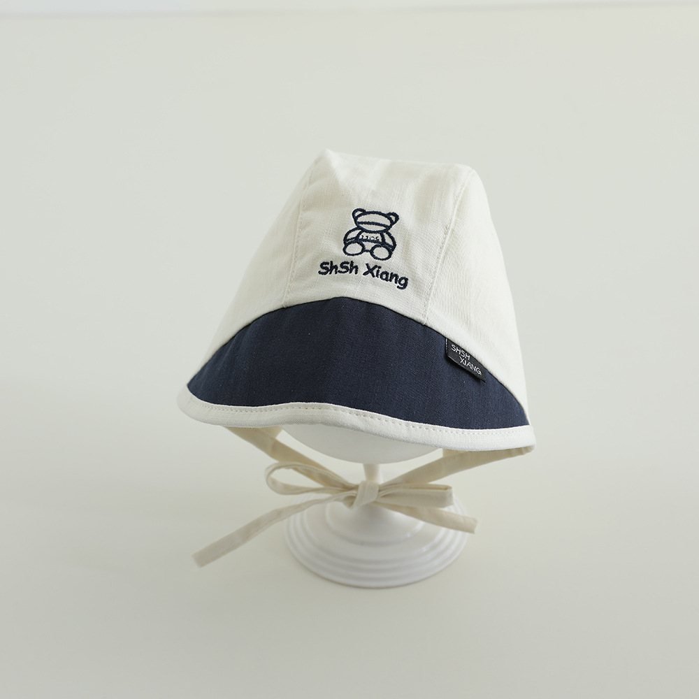 Sombrero coreano para bebés primavera y otoño delgado lazos letras baojou sombrero de corte sombrero de sombrero de abrigo recién nacido puerta de chimenea sombrero de marea