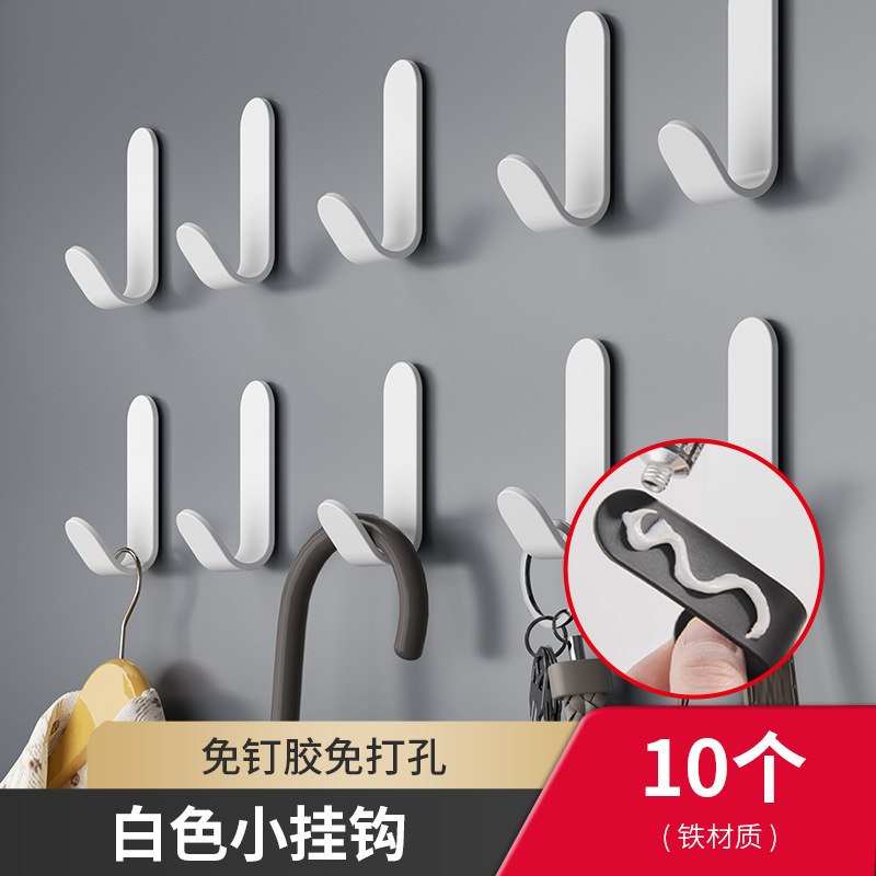 フックの強い接着剤をフックして、穴を開けないようにします。|undefined