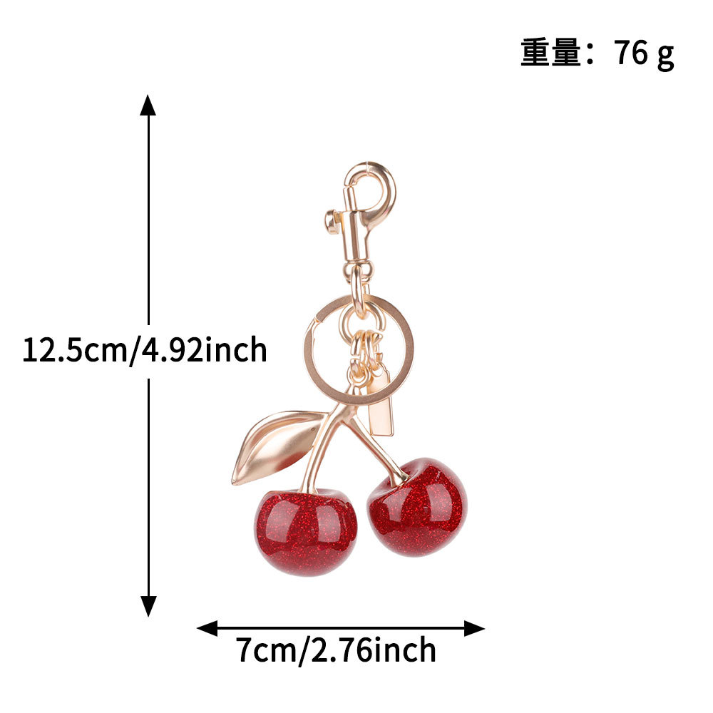 Transfronterizos directamente para bolsas de cereza colgantes de moda llaveras de automóviles llaveras de Amazon llaveras de metal accesorios de bolsas al por mayor
