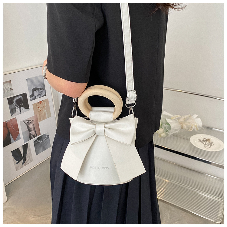 455g Weight Synthetic Leather Lining Material Sewing Thread Fashion Element Magnetic Buckle Closure Type Single Shoulder Strap, Double Handle Strap Type Bucket Bag Bags Type Casual Occasion Pu Leather Material Bow Knot Pattern All Seasons Season Women's Gender Elegant Style Bucket Shape Small Size Women's Small Pu Leather Bow Knot Elegant Sewing Thread Bucket Magnetic Buckle Bucket Bag 2