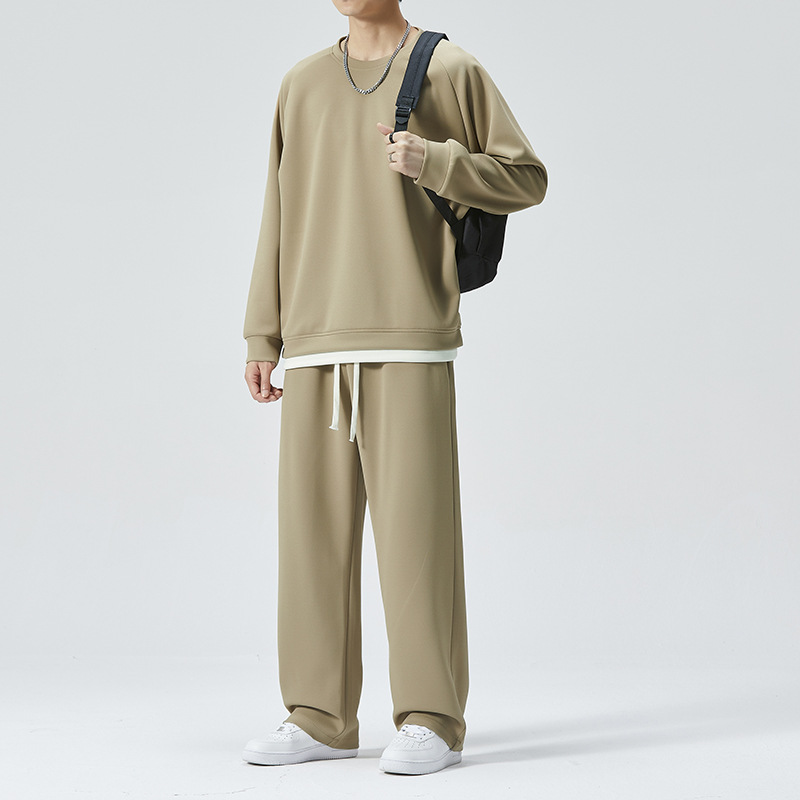 Otoño e invierno traje deportivo casual de los hombres de dos piezas de color sólido cuello redondo falso suéter de dos piezas pantalones de chándal traje de la moda de los hombres