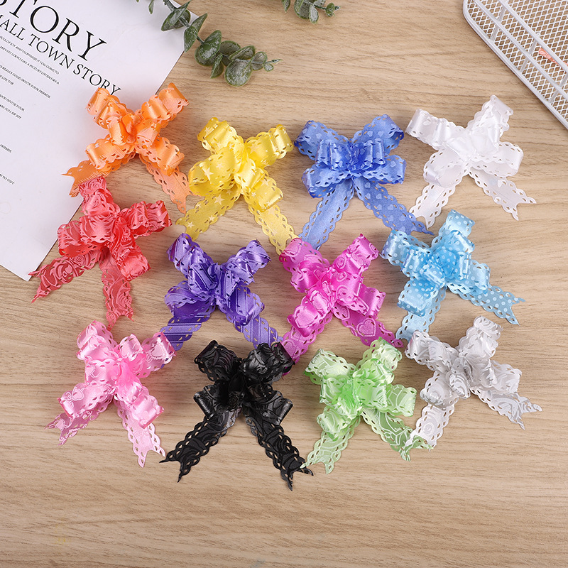 Comercio exterior Venta caliente 18 impreso encaje arco mano-Tirado flor Navidad vacaciones regalo embalaje tirar flor multicolor multi-patrón