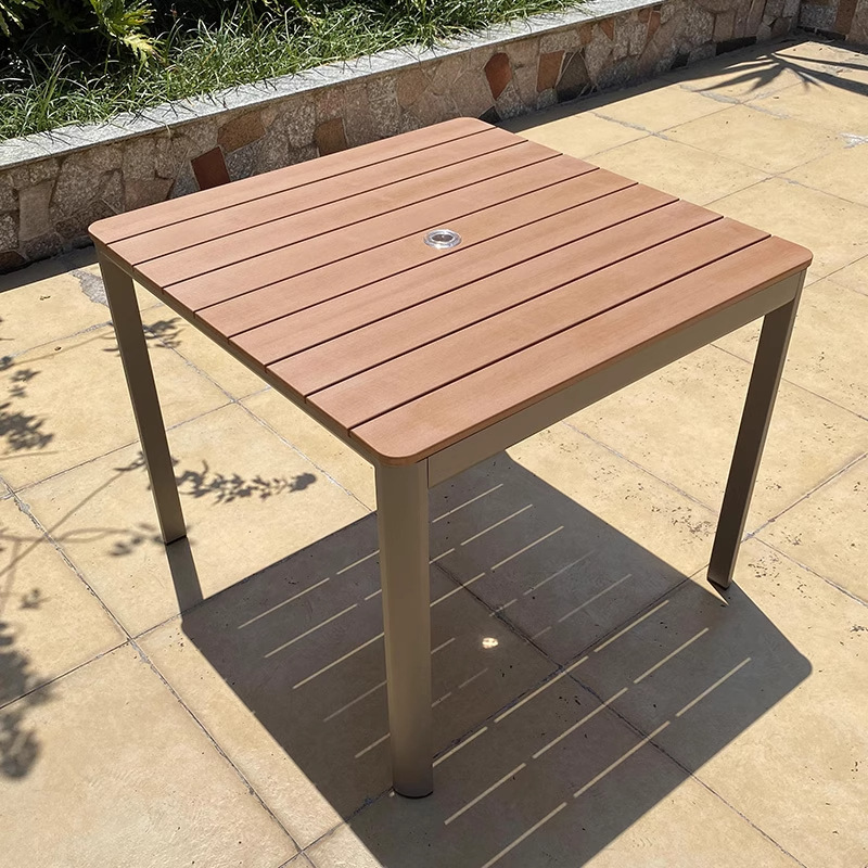 Mesa y silla de madera de plástico al aire libre patio al aire libre jardín terraza balcón a prueba de lluvia y protección solar combinación de mesa y silla de aleación de aluminio