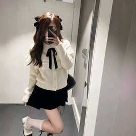 甜美蝴蝶结镂空针织开衫女早秋韩系穿搭学院风气质显瘦毛衣上衣