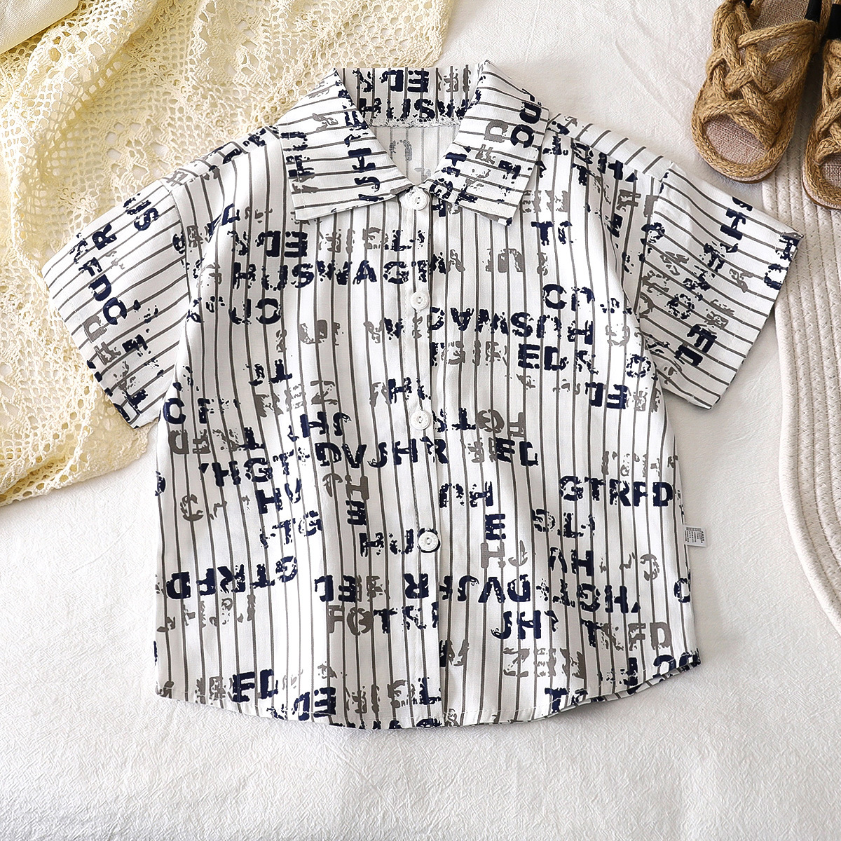 Camisas para niños verano algodón nuevo estilo niño coreano camisa de bebé de manga corta floral top para niños ropa para niños al por mayor