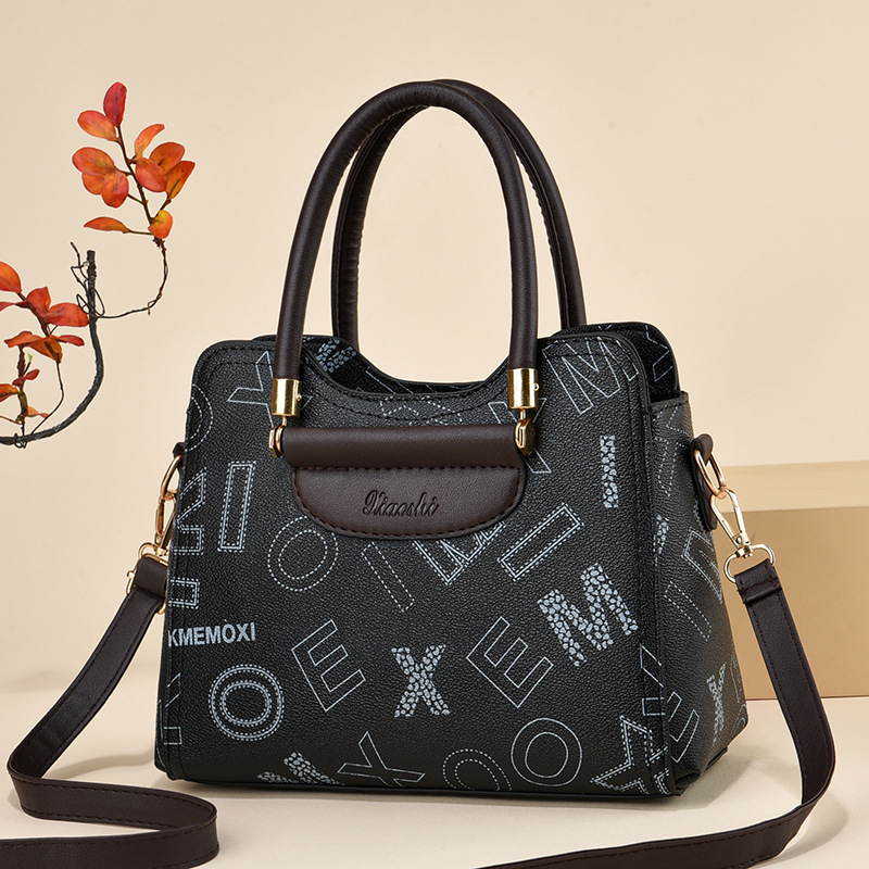 2024 fabricantes bolsos de mano de gran capacidad bolsos de mujer retro versátil bolsos de hombro texturas bolsos de tendencia