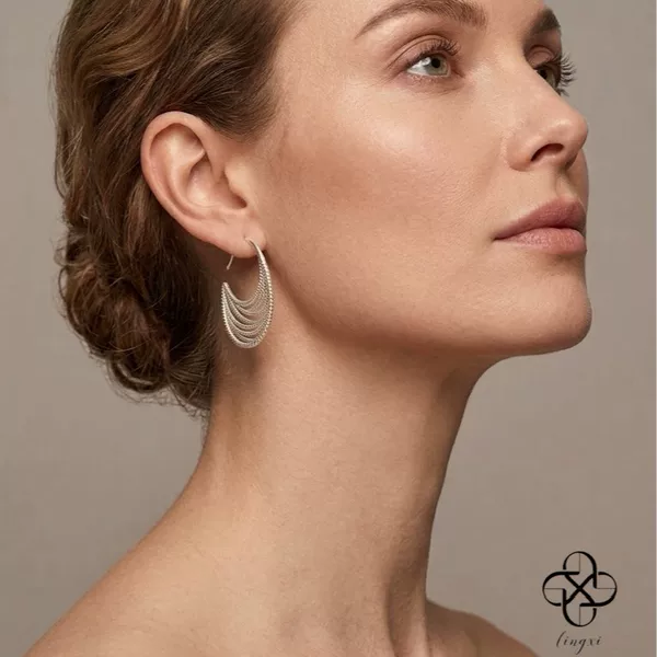 Vintage multi-layered tassel C-shaped earrings for women, ethnic style layered hollow wave niche old silver earrings, factory wholesale