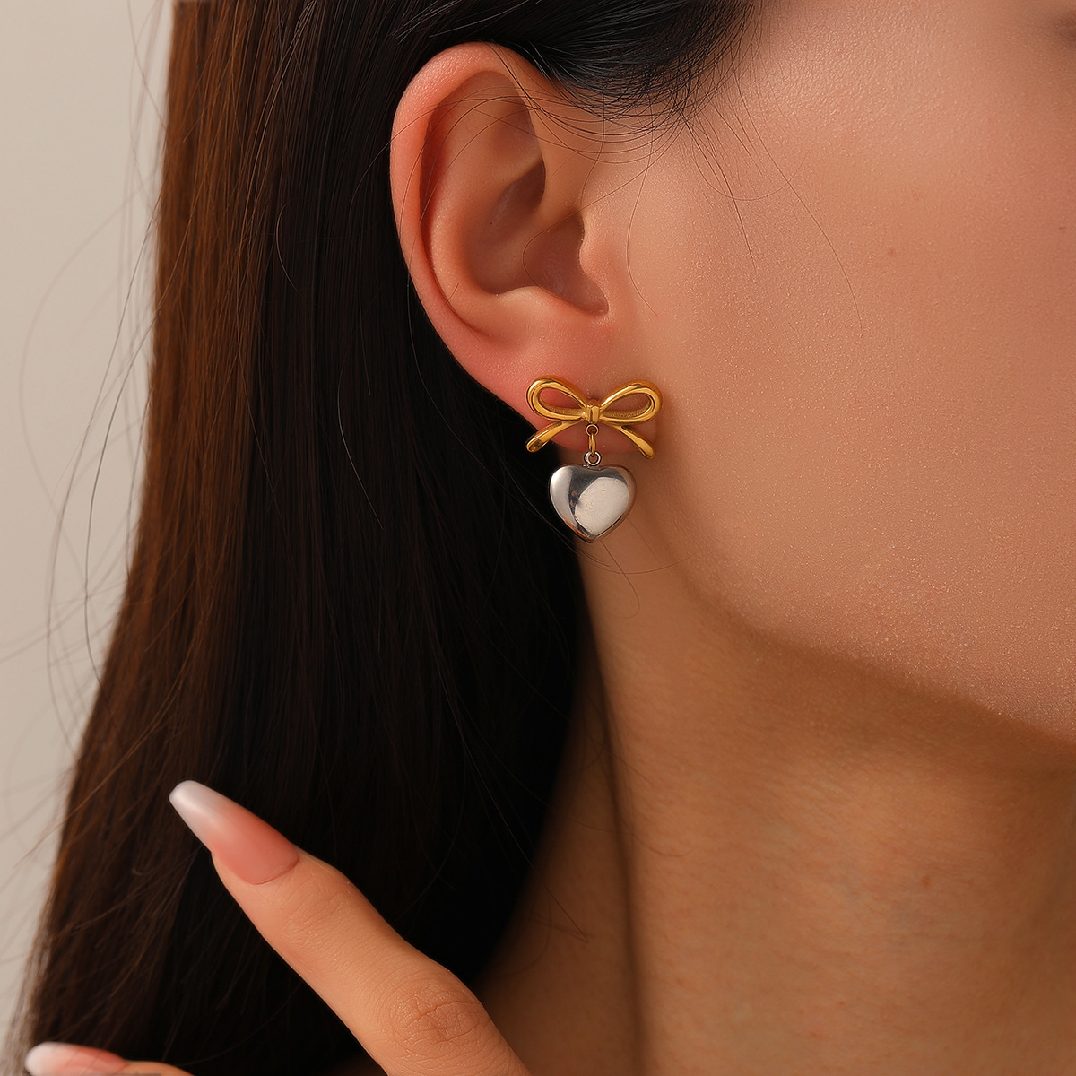 Europa y los Estados Unidos INS 18k oro acero inoxidable titanio acero francés nudo de cinta arco en forma de corazón pendientes de amor pendientes