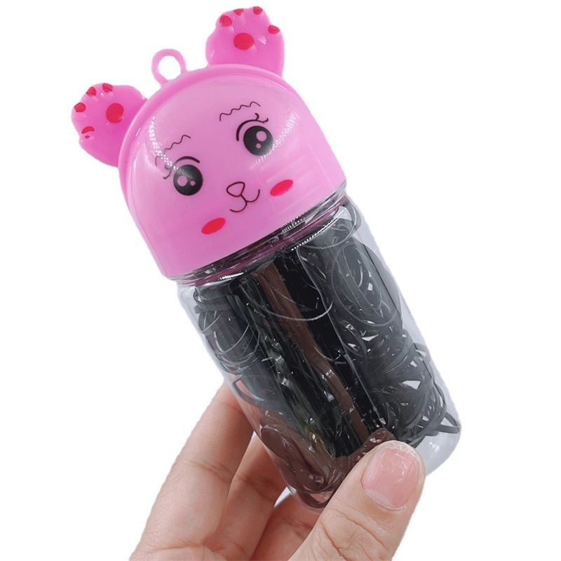 Nueva historieta embotellada banda de goma desechable fuerte tirón de los niños banda de pelo Color Negro cabeza de bebé cuerda caso de cuero