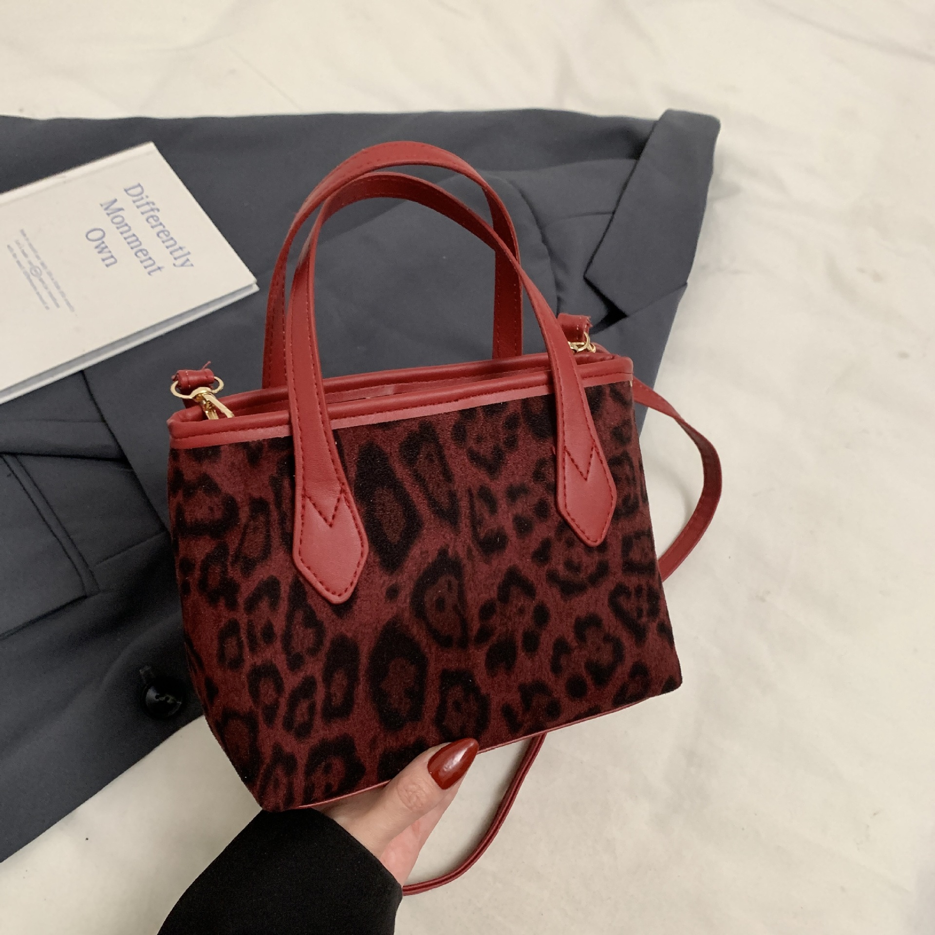 Otoño y invierno super caliente leopardo bolso de mano para mujeres 2024 nuevo bolso de mano de trabajo bolso de cubo de hombro