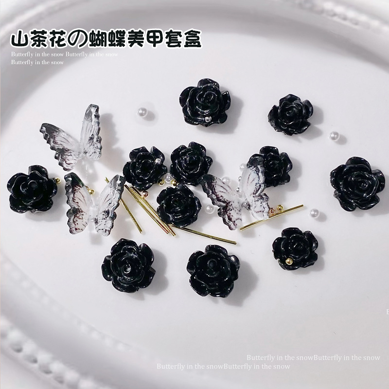 Net red nail drill Camellia pearl jewelry black and white three-dimensional butterfly nail accessories set box nail jewelry wholesale