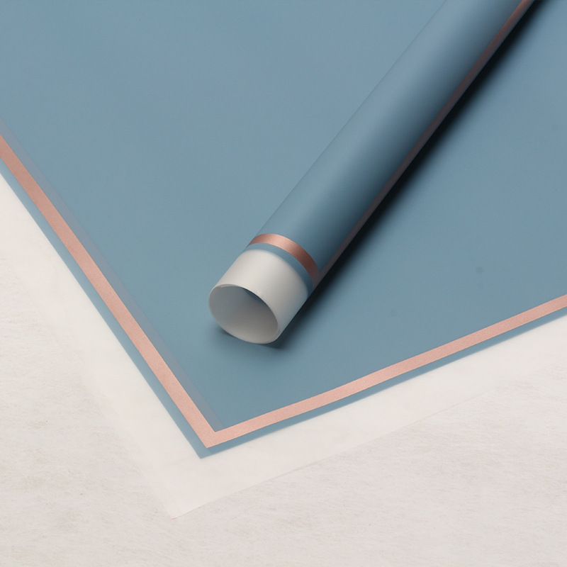 Huaxi transfronterizo Han Bundle de papel volador de película de gel de envoltura de flores impermeable florista suministros de flores papel de envoltura de ramo