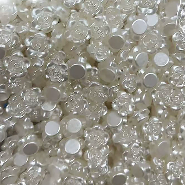 About 1200 12MM pearlescent white flowers