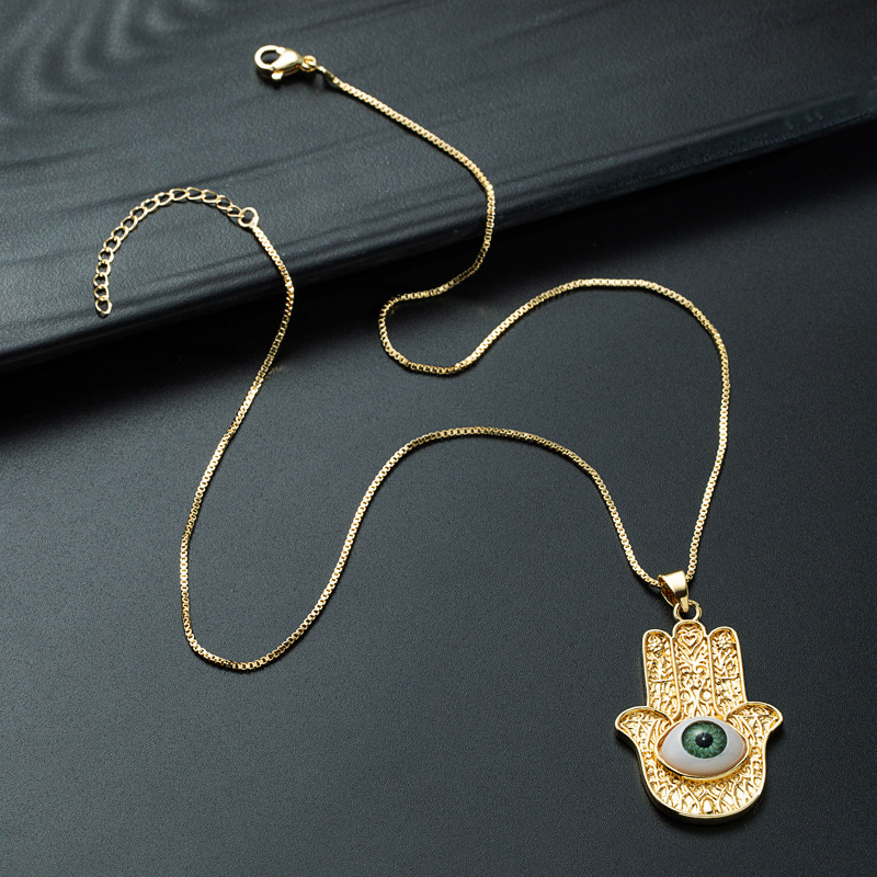 Nihaojewelry Wholesale Jewelry Hip Hop Devils Eye Palm Pendant Copper Goldplated Oil Dropping Necklacepicture8