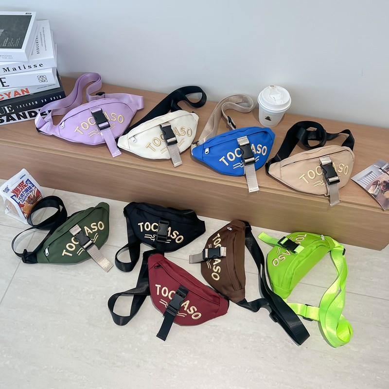 Riñonera para niños con letras de estilo occidental Versión coreana Bolsos de pecho para niños y niñas de moda fresca y popular Bolsos para niños de lona de moda nueva