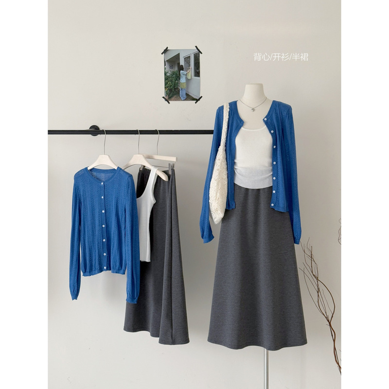 2026 Real Shot V-Neck Hollow Knit Cardigan Top + White Knit Camisole + Loose Skirt Three-Piece Set for Women 2026 Real Shot V-Neck Hollow Knit Cardigan Top + White Knit Camisole + Loose Skirt Three-Piece Set for Women